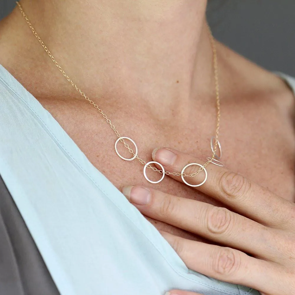 Skipping Stone Necklace & Oh Earrings Set
